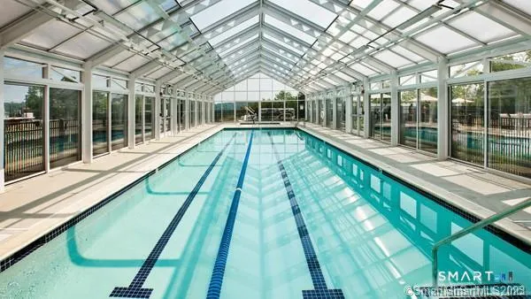 a view of swimming pool with a large windows