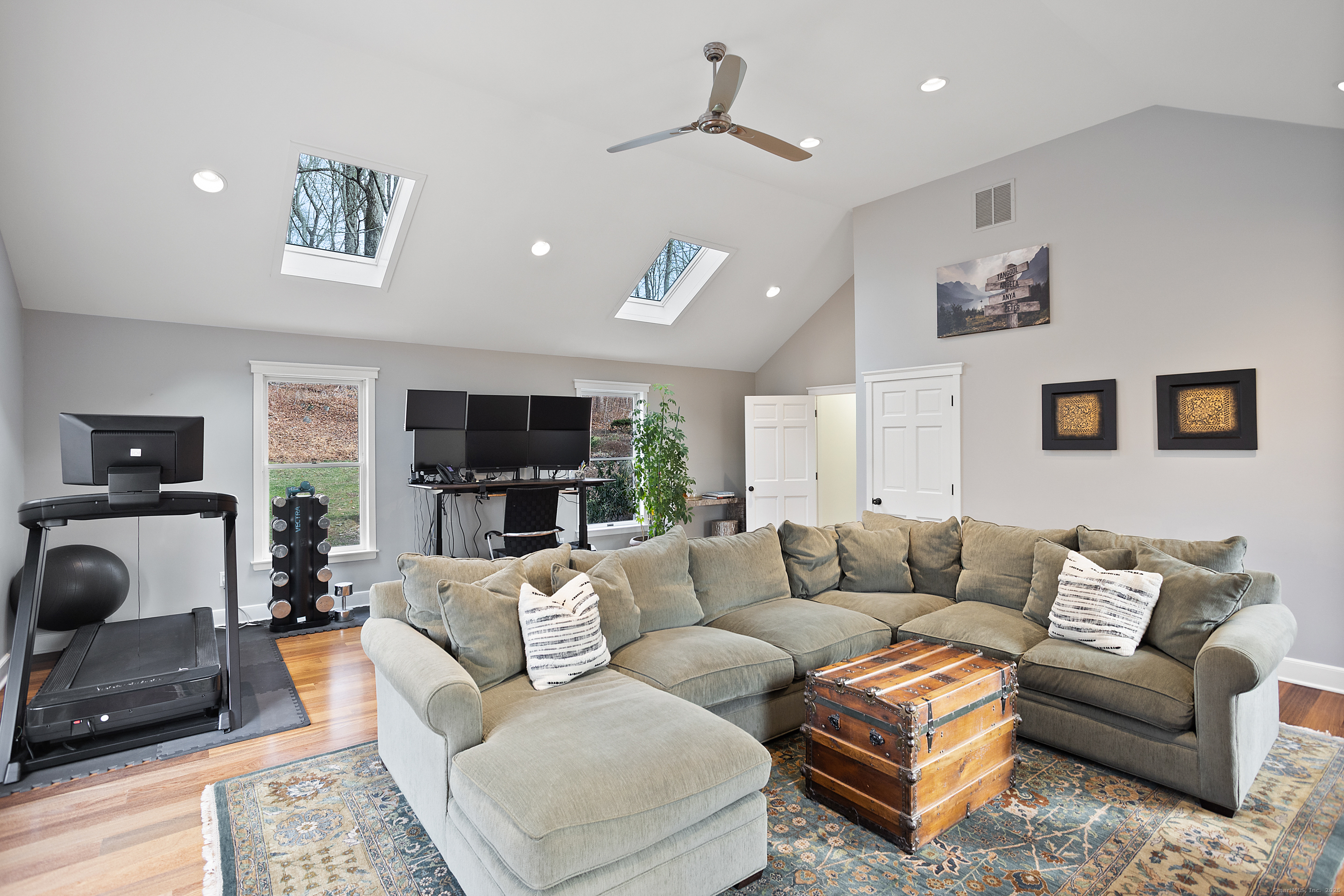41 Deer Hill Road Redding, CT 06896 - Photo 13 of 31 a living room with furniture and a flat screen tv