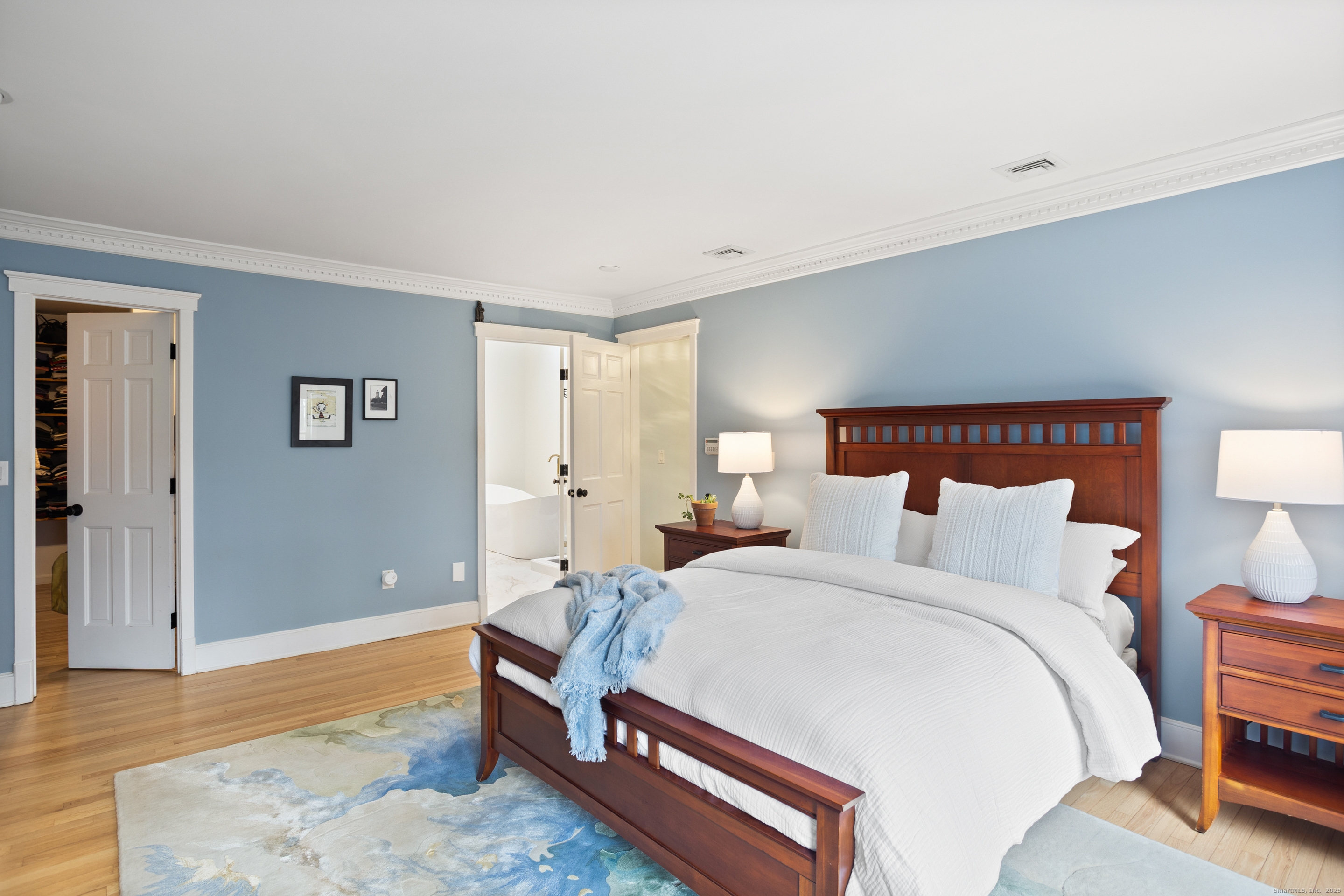 41 Deer Hill Road Redding, CT 06896 - Photo 18 of 31 a spacious bedroom with a bed and a night stand