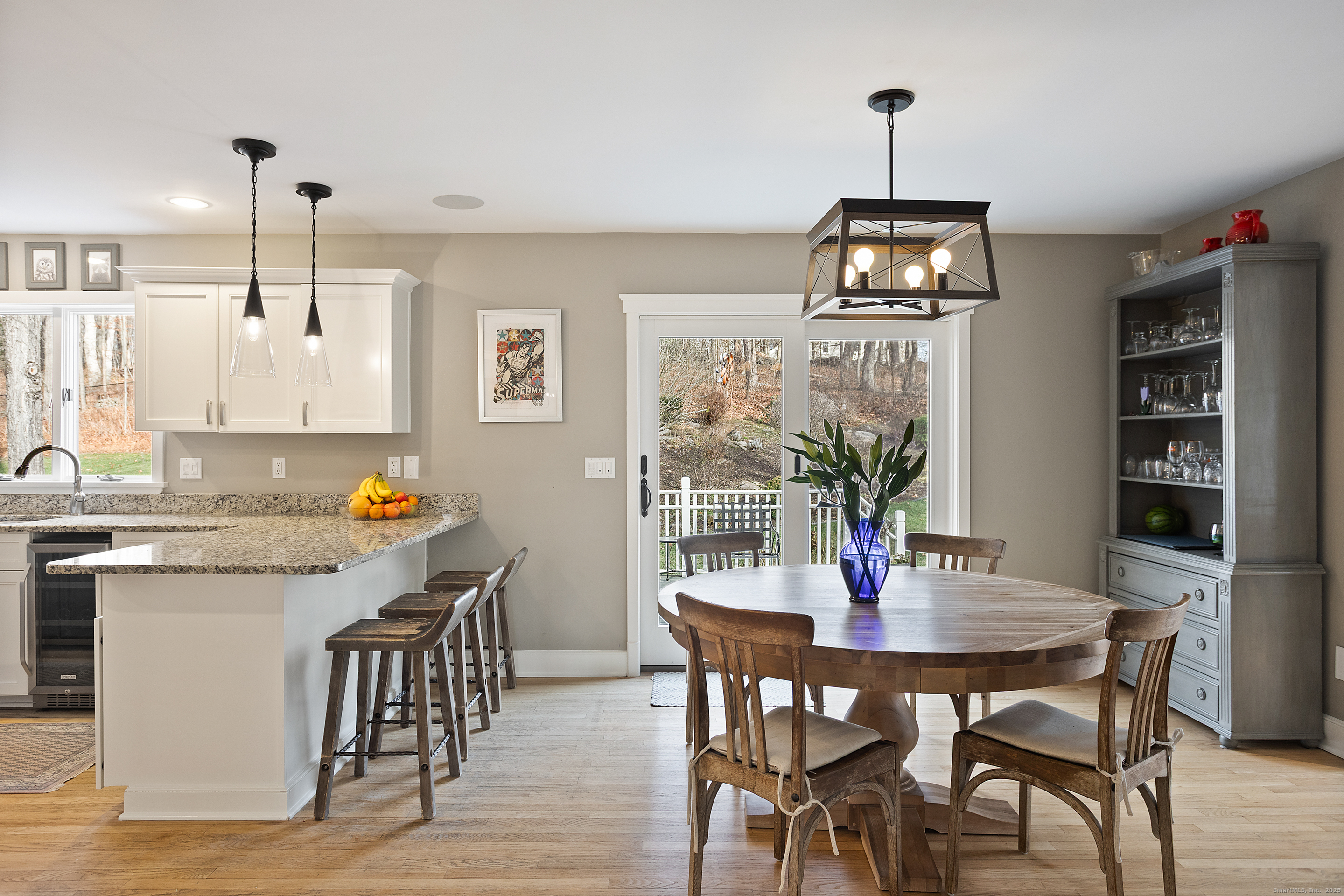 41 Deer Hill Road Redding, CT 06896 - Photo 8 of 31 a view of a dining room with furniture window and wooden floor