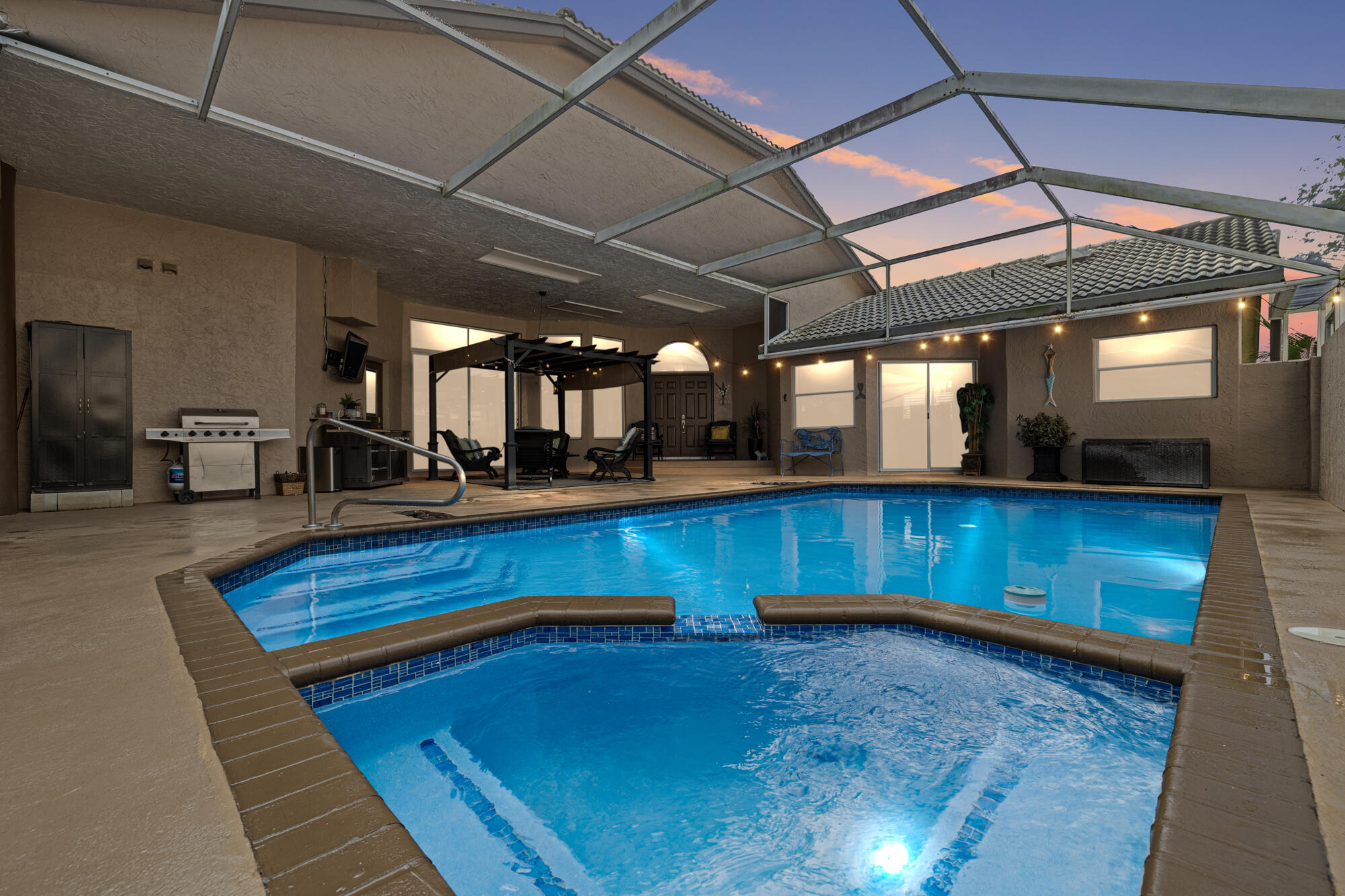 12430 Baywind Court Boca Raton, FL 33428 - Photo 1 of 29 Courtyard Pool at Sunset