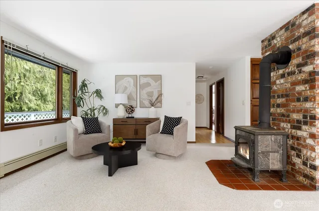 a bathroom with a double vanity sink toilet and a mirror
