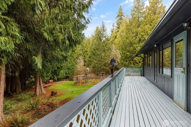 a view of balcony and yard