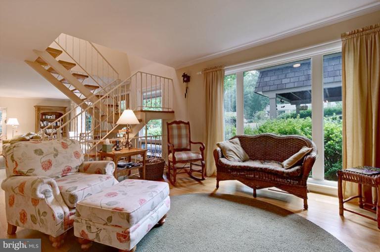 12104 Stirrup Road Reston, VA 20191 - Photo 11 of 27 a bedroom with furniture and a large window