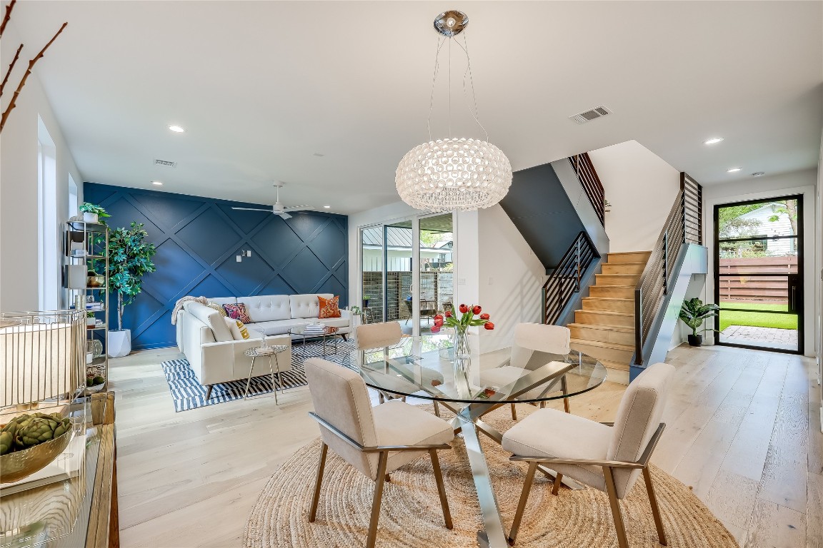 1213 Taylor Street Austin, TX 78702 - Photo 1 of 1 a living room with furniture and a wooden floor
