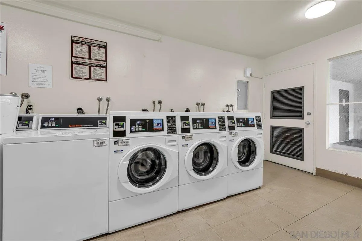 6780 Friars Road, Unit 214 San Diego, CA 92108 - Photo 21 of 23 a utility room with dryer and washer