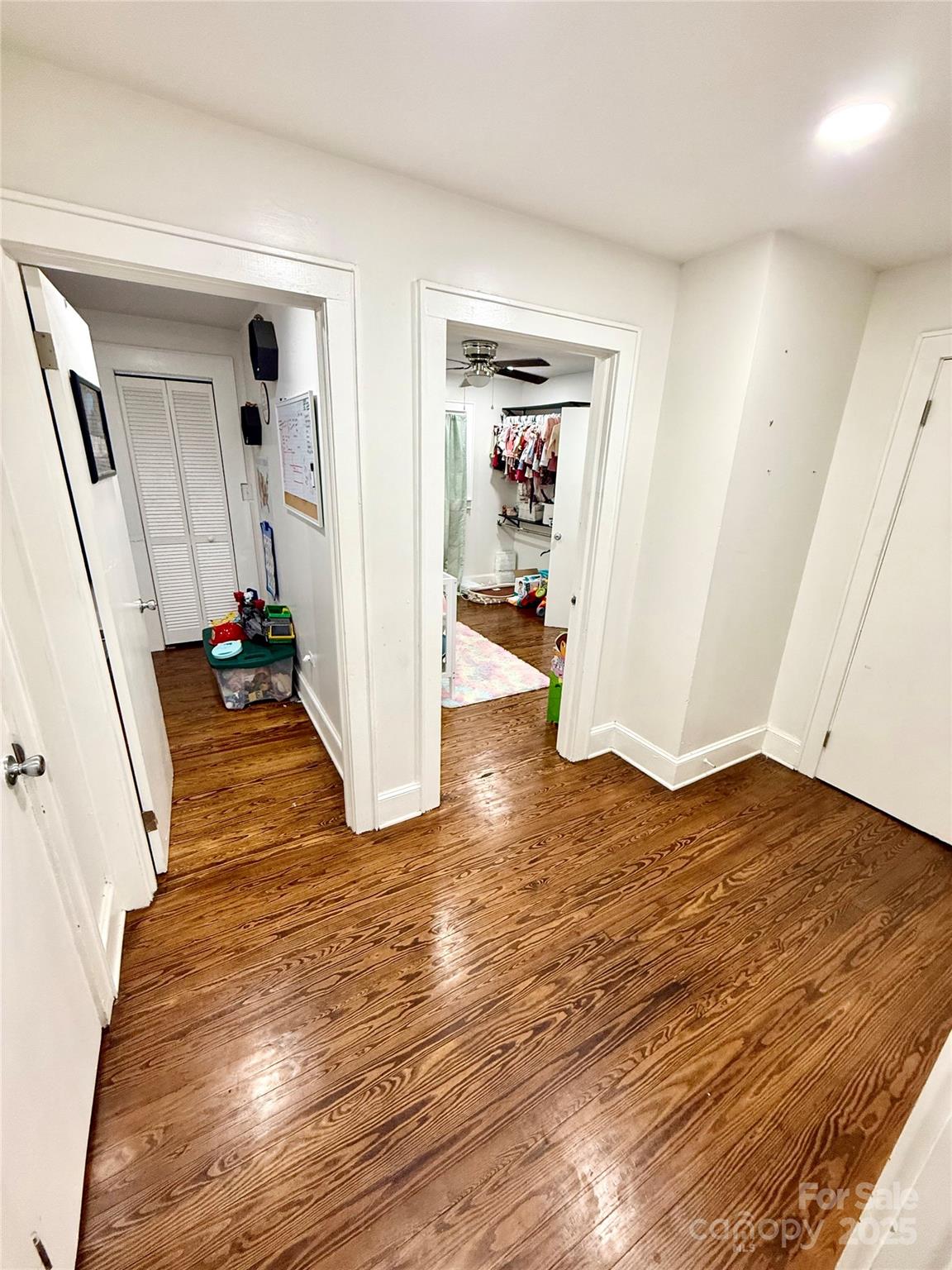245 Church Street Ellenboro, NC 28040 - Photo 12 of 18 a view of a hallway view with wooden floor and staircase