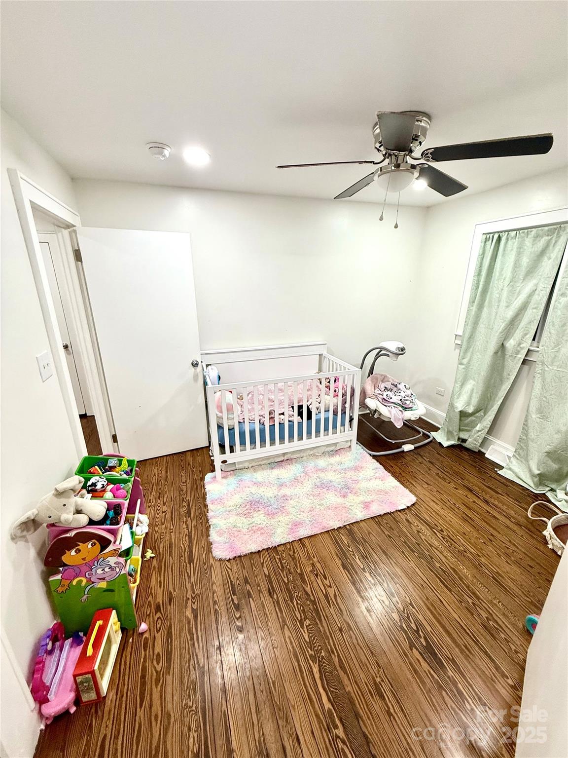 245 Church Street Ellenboro, NC 28040 - Photo 16 of 18 a bedroom with a bed and a dresser