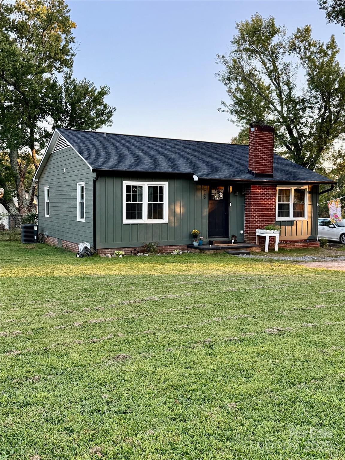 245 Church Street Ellenboro, NC 28040 - Photo 2 of 18 a house view with a garden space