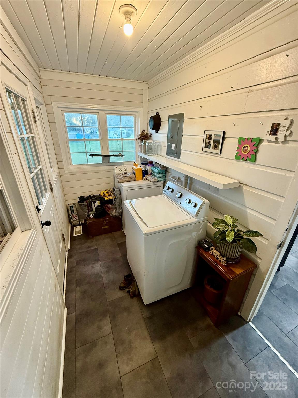 245 Church Street Ellenboro, NC 28040 - Photo 7 of 18 a white bath tub sitting in a bathroom next to a window