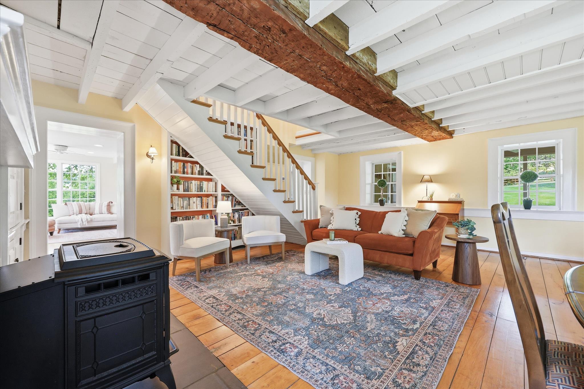 10919 Etzler Mill Road Woodsboro, MD 21798 - Photo 5 of 54 Beamed ceiling, wood floors & a pellet stove...