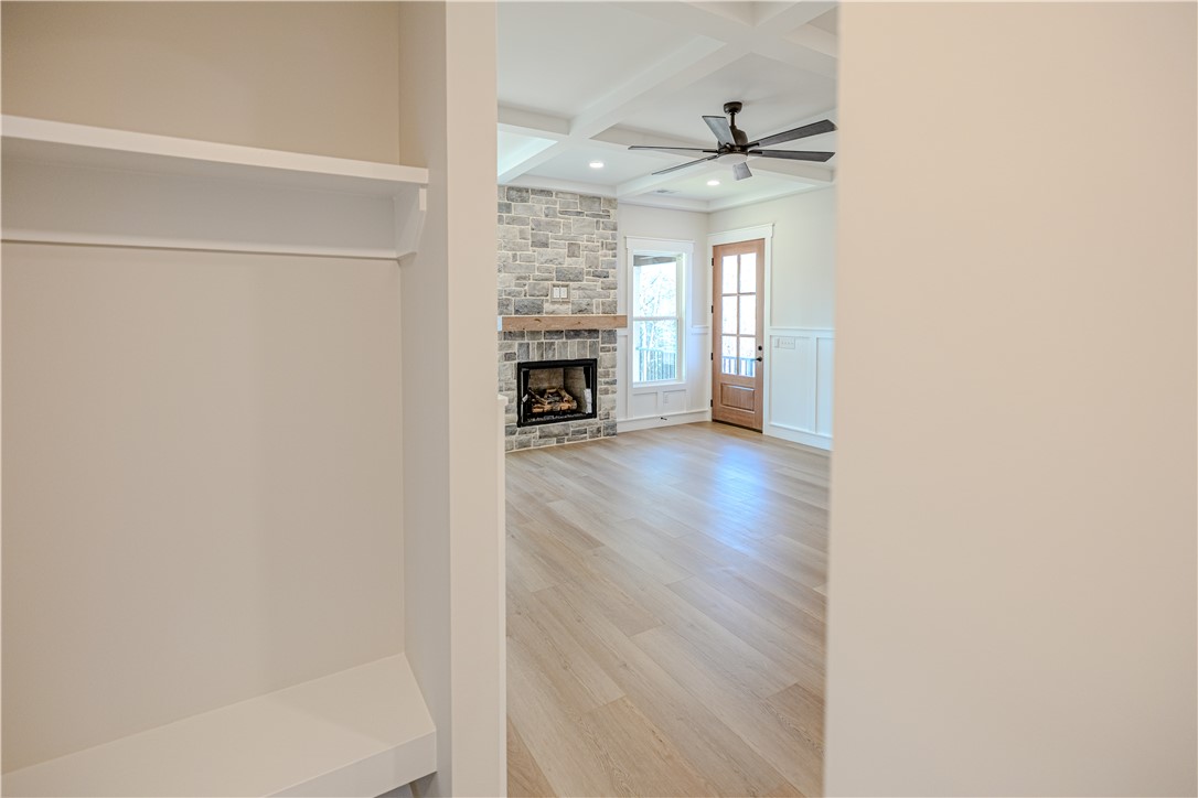 1409 Stonehurst Road Anderson, SC 29621 - Photo 35 of 37 This inviting interior features a warm fireplace and ample natural light.
