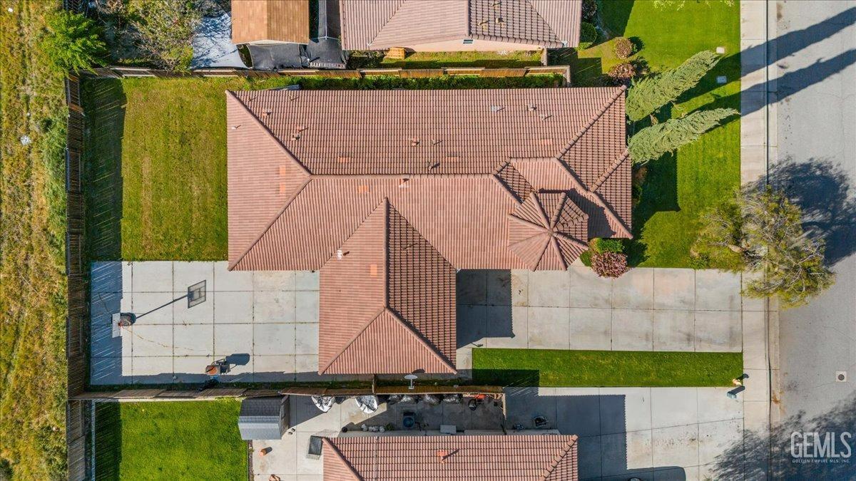 Undisclosed Address Shafter, CA 93263 - Photo 11 of 11 an aerial view of a house with a yard