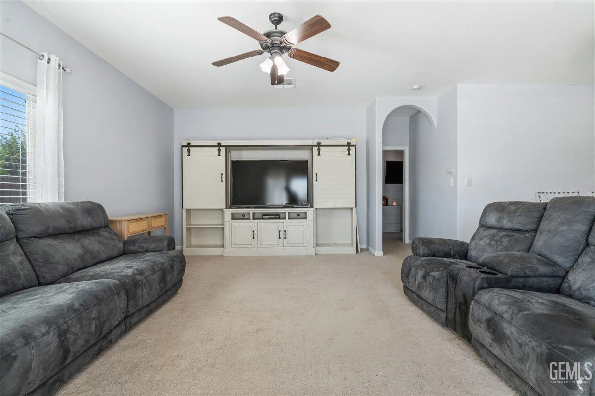 Undisclosed Address Shafter, CA 93263 - Photo 6 of 11 a living room with furniture and a flat screen tv
