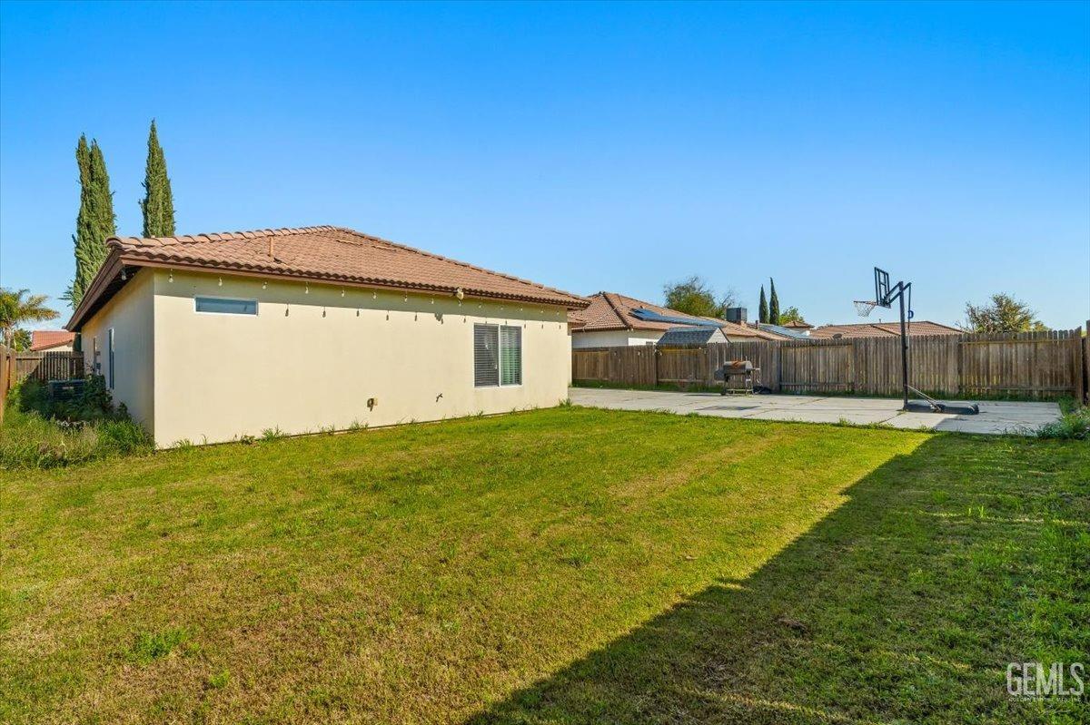 Undisclosed Address Shafter, CA 93263 - Photo 10 of 11 a front view of a house with garden