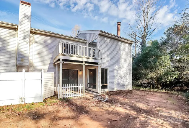 a view of a balcony with door