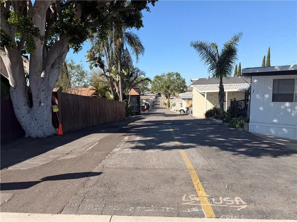 a view of a backyard of the house
