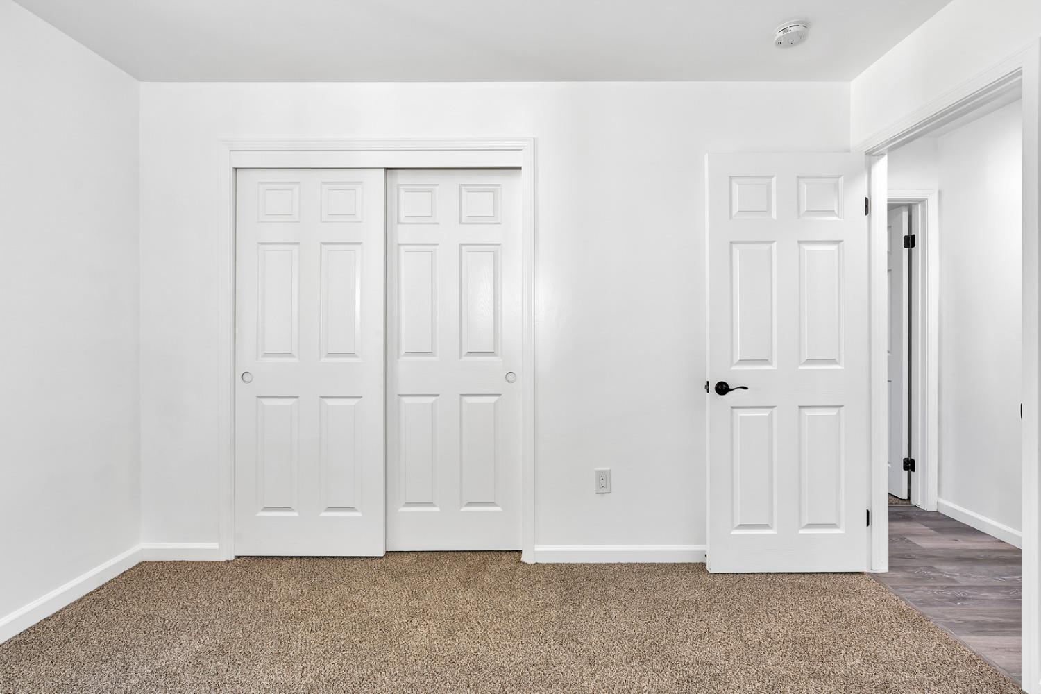 13612 Dromore Court Bakersfield, CA 93314 - Photo 18 of 35 an empty room with white door