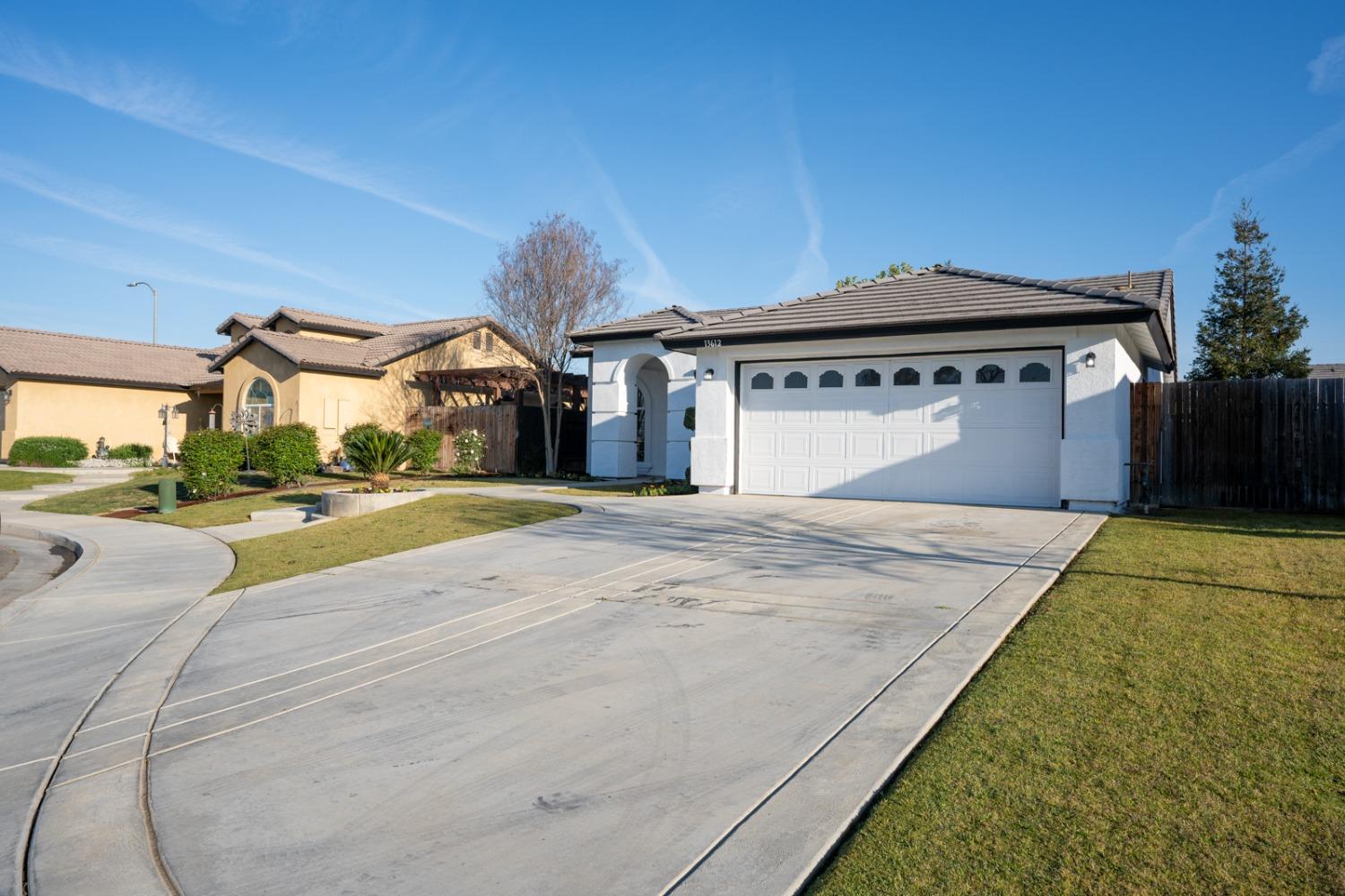 13612 Dromore Court Bakersfield, CA 93314 - Photo 2 of 35 a front view of a house with a yard