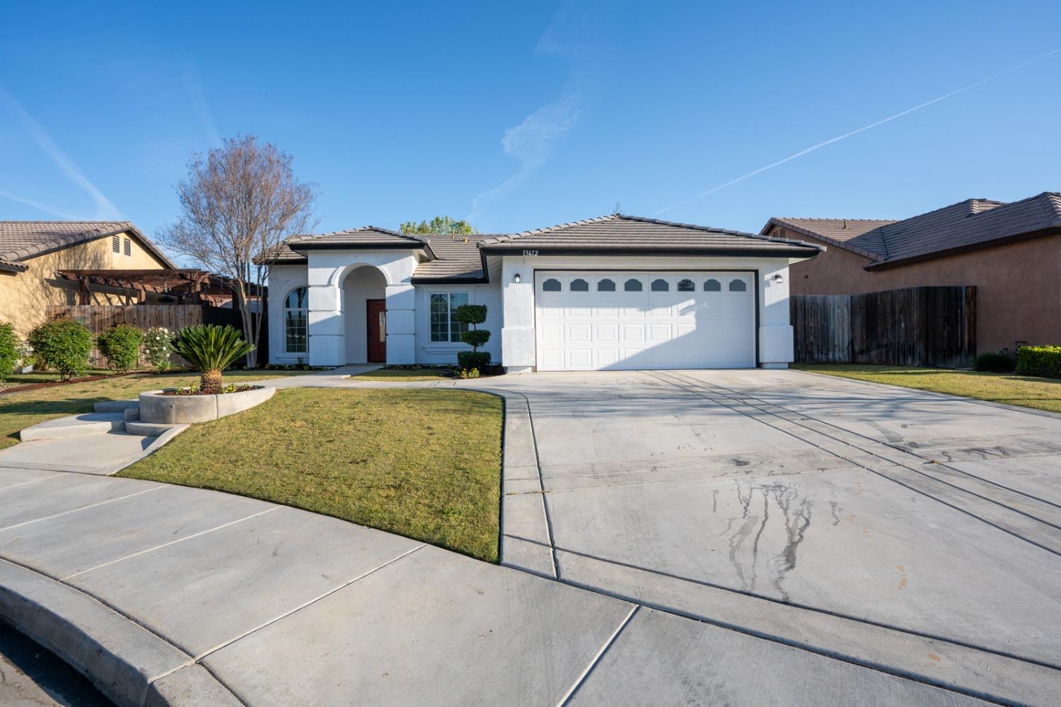 13612 Dromore Court Bakersfield, CA 93314 - Photo 3 of 35 a view of the house with swimming pool