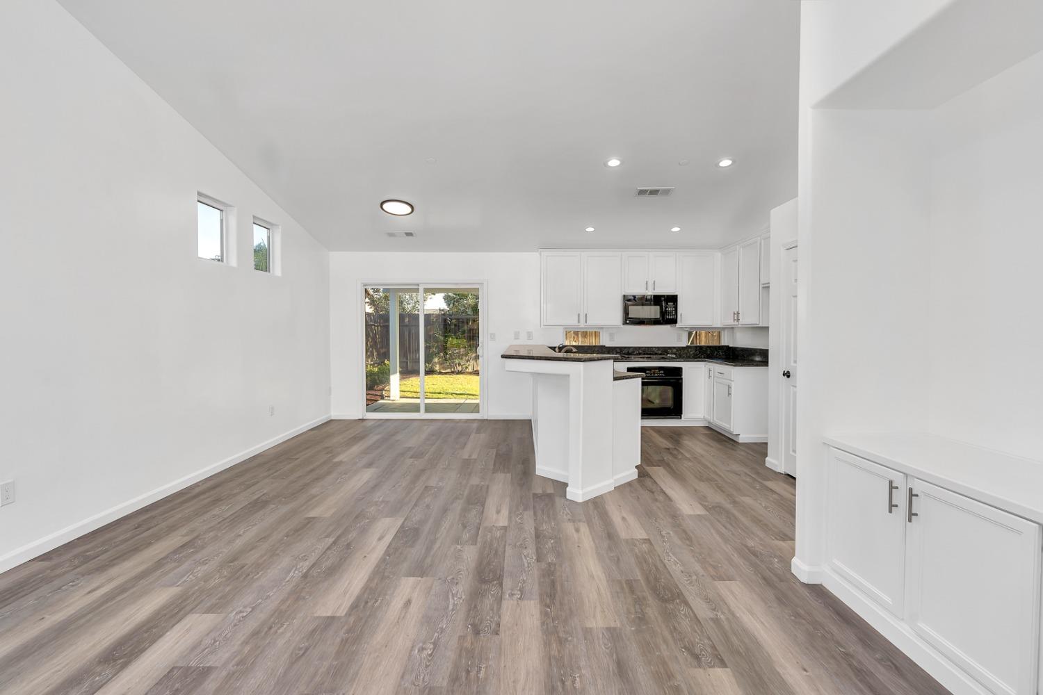 13612 Dromore Court Bakersfield, CA 93314 - Photo 7 of 35 a view of kitchen with wooden floor