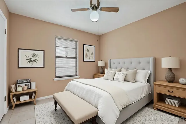 a bedroom with a bed a dresser and chair