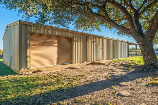 a view of parking garage with furniture