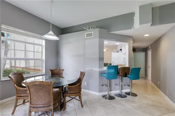 $279,000 | 25080 Peacock Lane, Unit 102, Naples, FL 34114