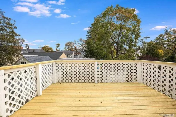 a aerial view of a house with a yard