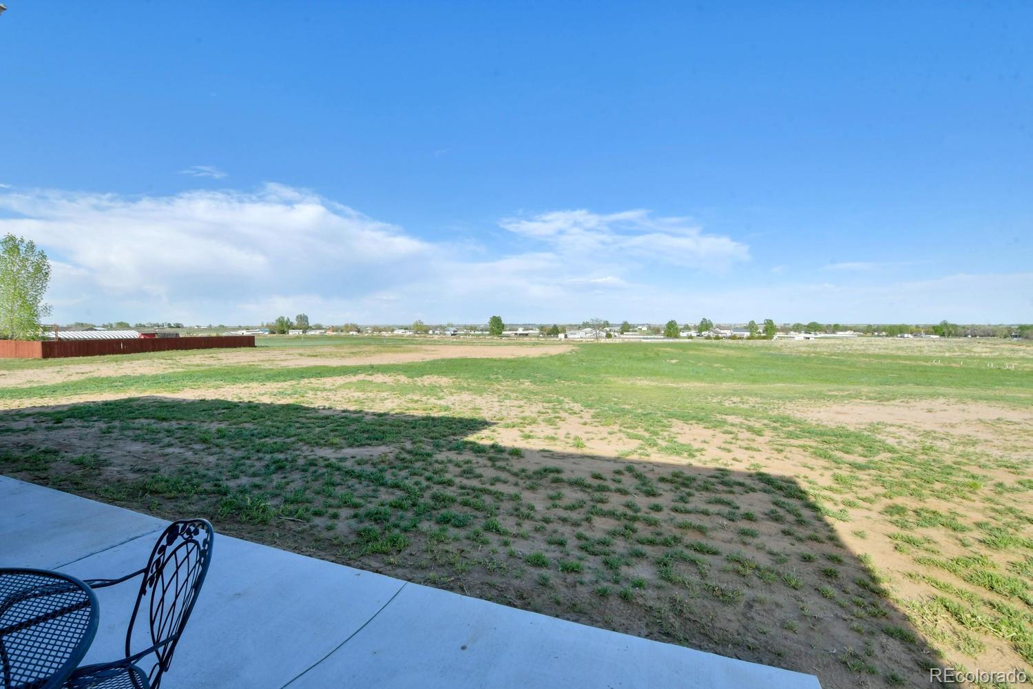 4188 Meadowlark Road Fort Lupton, CO 80621 - Photo 35 of 36 a view of an ocean and beach