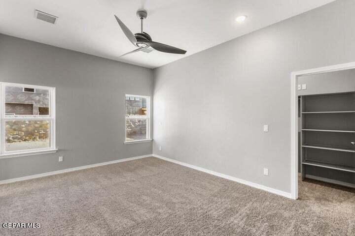 6052 Summer Ridge Sunland Park, NM 88008 - Photo 7 of 10 a view of an empty room with a window