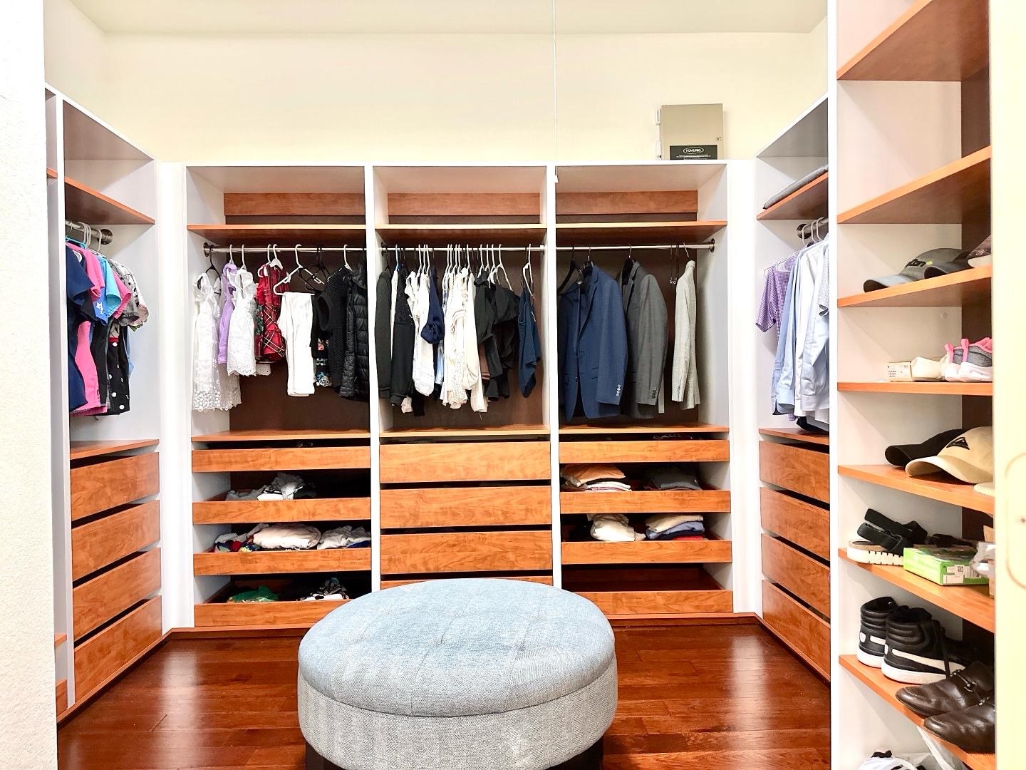 1110 Penny Ranch Lane Katy, TX 77494 - Photo 23 of 31 a view of walk in closet with clothes and shoes