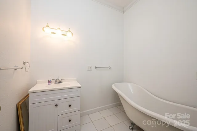 a bathroom with a sink a toilet and bathtub