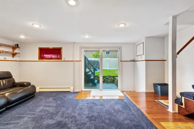 a view of livingroom with furniture and windows