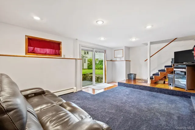 a bed room with a bed and a television