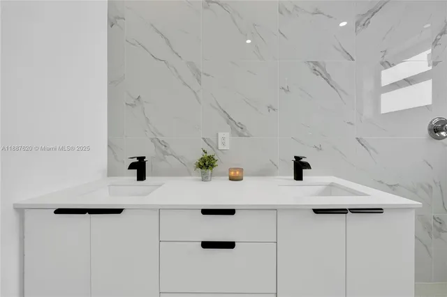 a bathroom with a sink and a bathtub