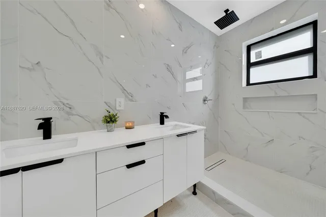 a bathroom with a sink and a bathtub
