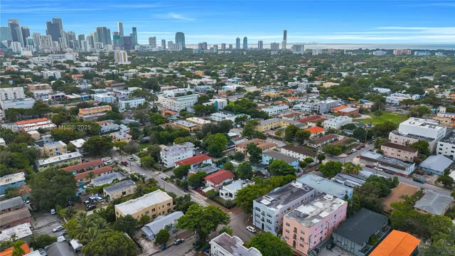 an aerial view of residential building and green space