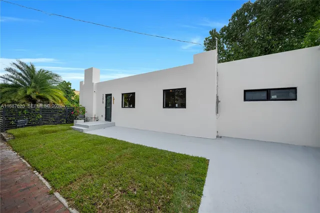a view of a backyard with plants