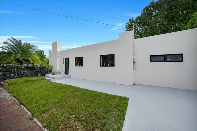a view of a backyard with plants