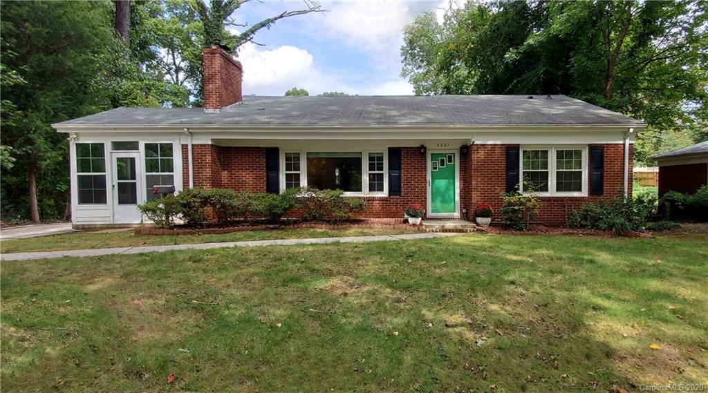 2221 Arnold Drive Charlotte, NC 28205 - Photo 1 of 23 front view of a house with a garden