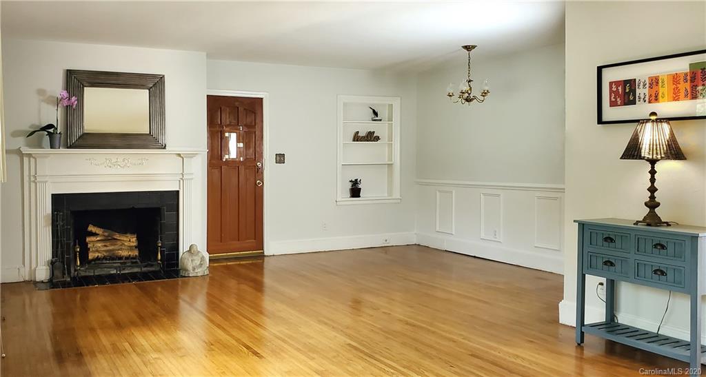 2221 Arnold Drive Charlotte, NC 28205 - Photo 4 of 23 a living room with furniture and a fireplace