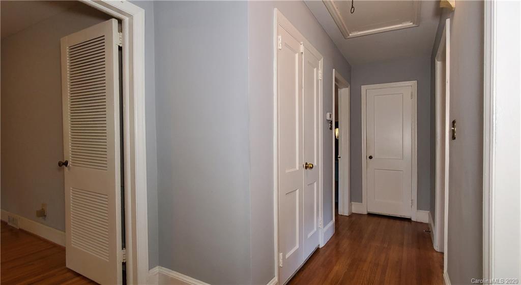 2221 Arnold Drive Charlotte, NC 28205 - Photo 9 of 23 a view of a hallway with wooden floor