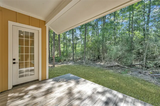 a view of a backyard with garden