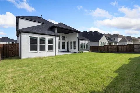a view of a house with a garden