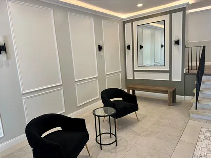 a bathroom with a sink and mirror