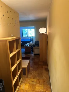 a view of a living room and a window