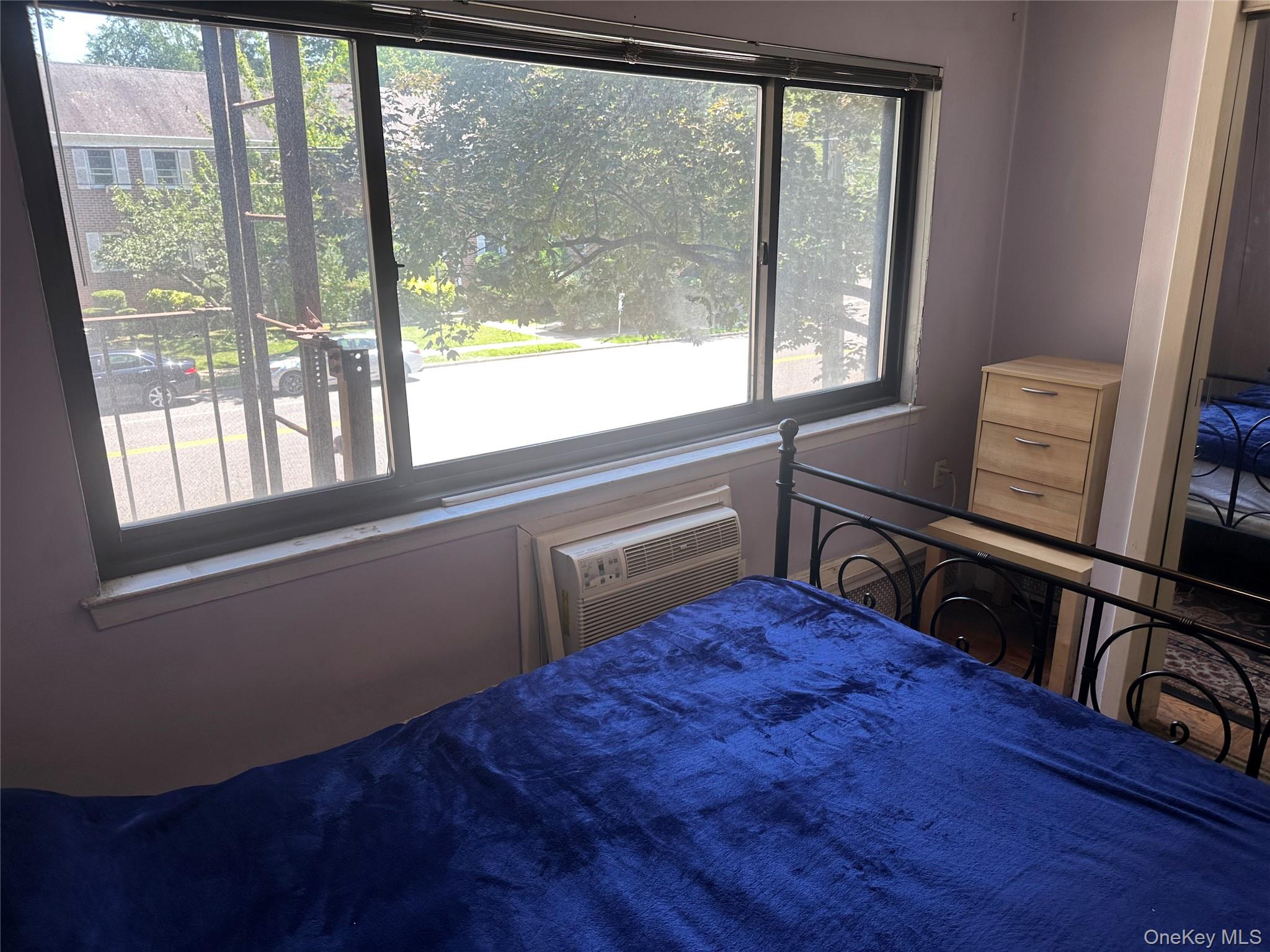 2201 Palmer Avenue, Unit 2F New Rochelle, NY 10801 - Photo 10 of 16 a view of a living room and a window