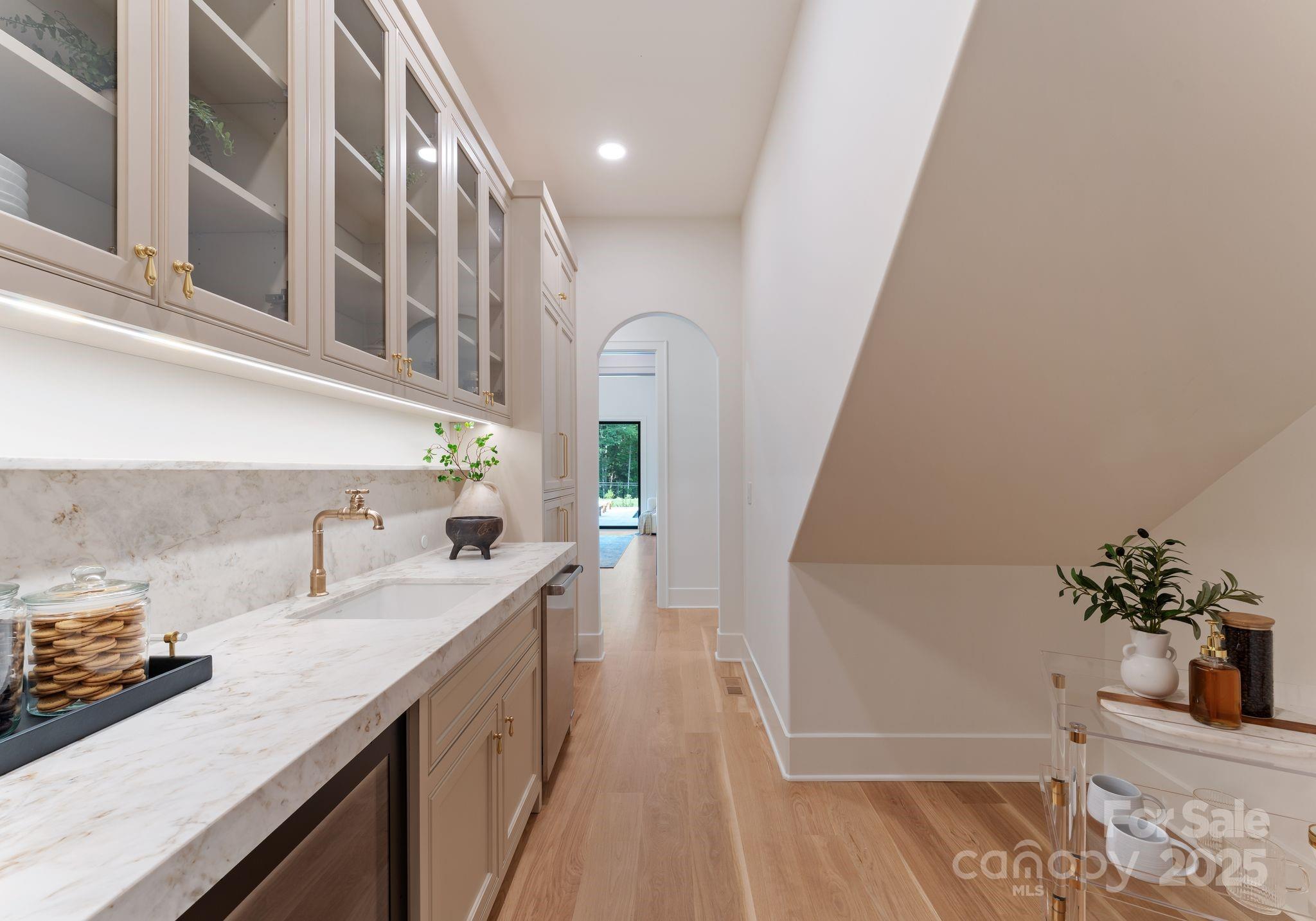 15037 June Washam Road Davidson, NC 28036 - Photo 25 of 48 a bathroom with a sink and a mirror