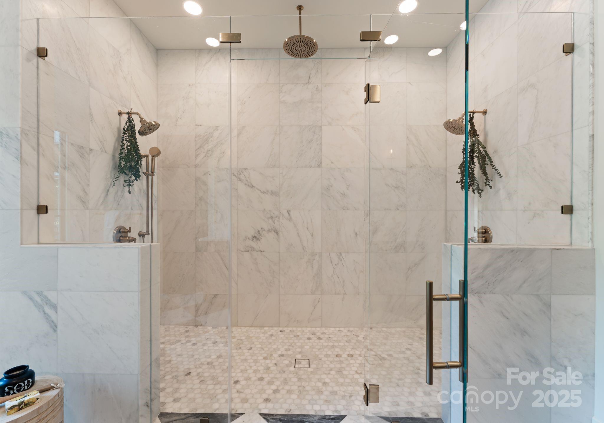 15037 June Washam Road Davidson, NC 28036 - Photo 29 of 48 a bathroom with a shower